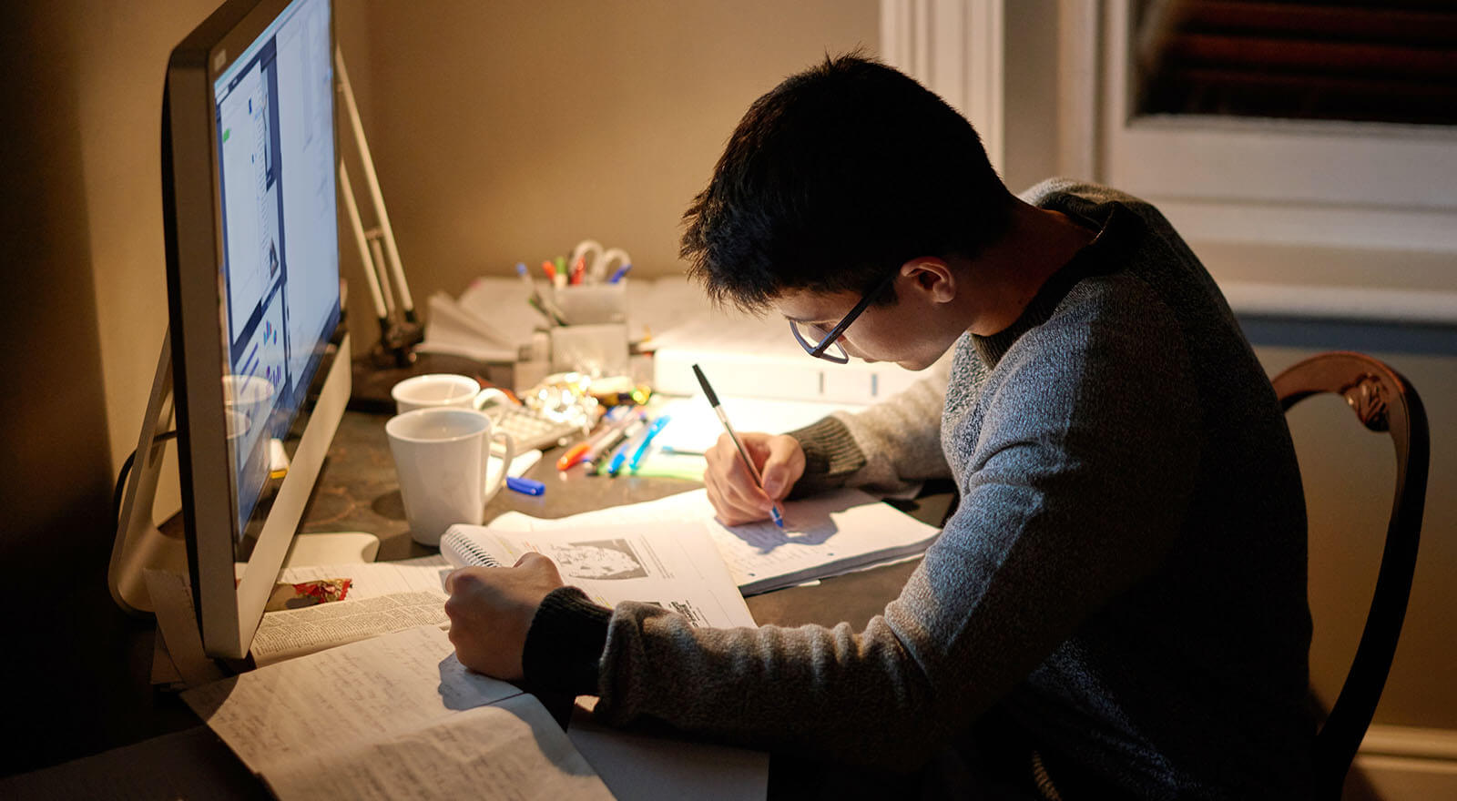 Medical student studying at night